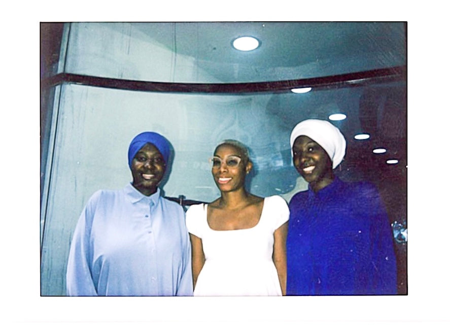 Hawa (pictured in the middle), the founder of H.A.W.A au Feminin the reinsertion center that SKINSWEAR has collaborated with for our repair service. Fanta and Sating the girls on the sides will be in charge of all the repairs.